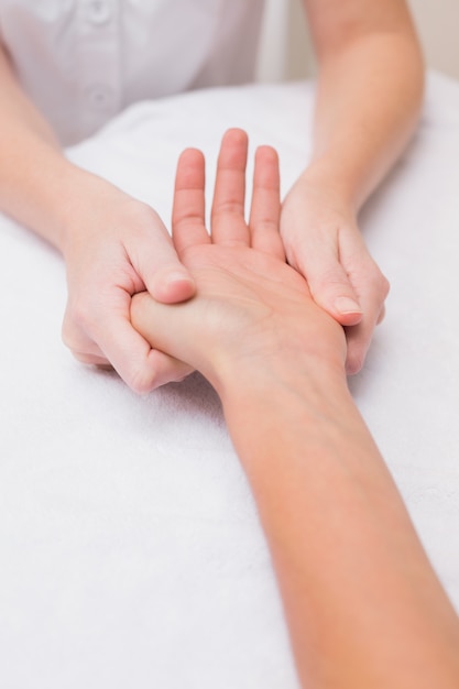 Woman getting a hand massage