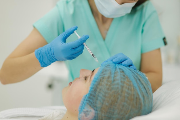 Woman getting injection Beauty injections and cosmetology in beaty clinic Cosmetologys in medical