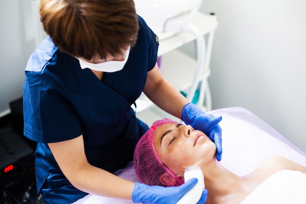 Woman getting massage at the beauty clinic