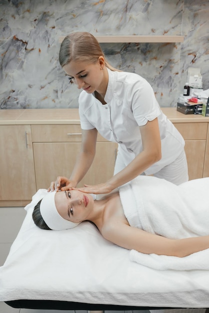 A woman getting a massage in a spa