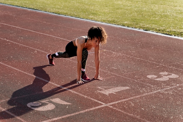 Woman getting ready to run