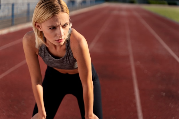 Woman getting ready to run