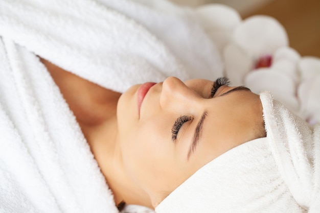 Woman getting spa massage treatment at beauty spa salon