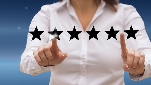 Woman give rating to service excellent experience on mobile phone application