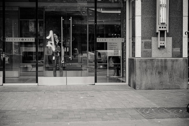 Woman Behind Glass Door Photo