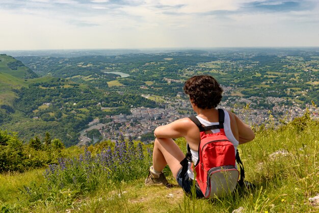 Woman go hiking in the mountains