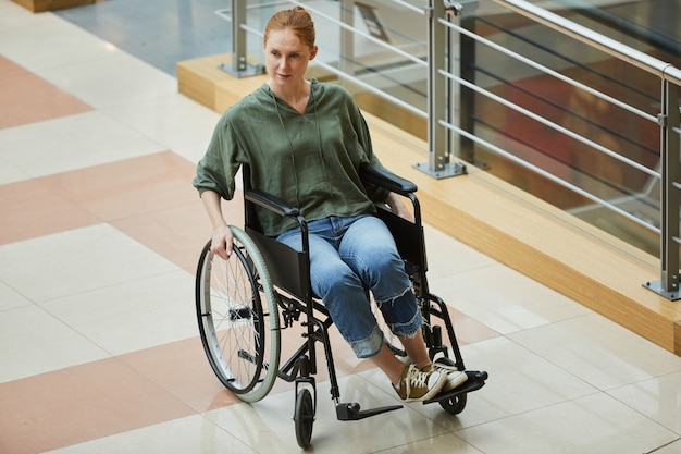 Woman going on wheelchair