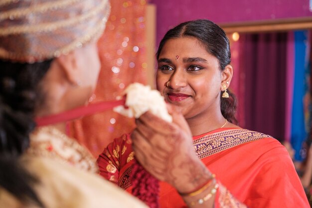 Woman granting her trust to her partner in a religious ceremony Concept culture religion