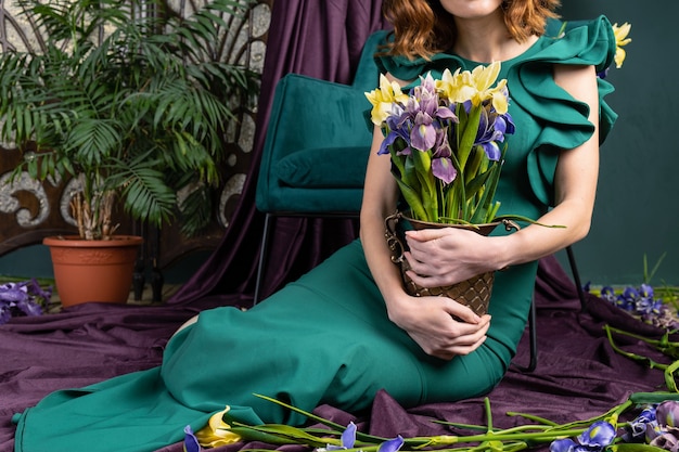 Woman in a green dress with flowers