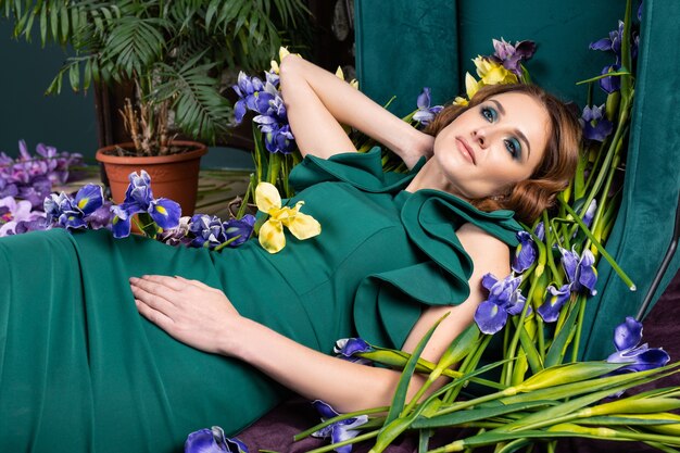 Woman in a green dress with flowers