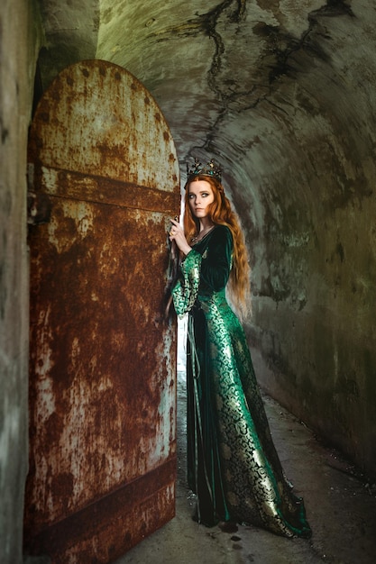 Woman in green medieval dress