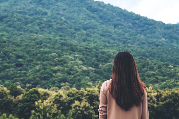 woman and green mountain