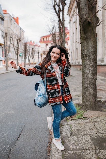 Woman hailing taxi