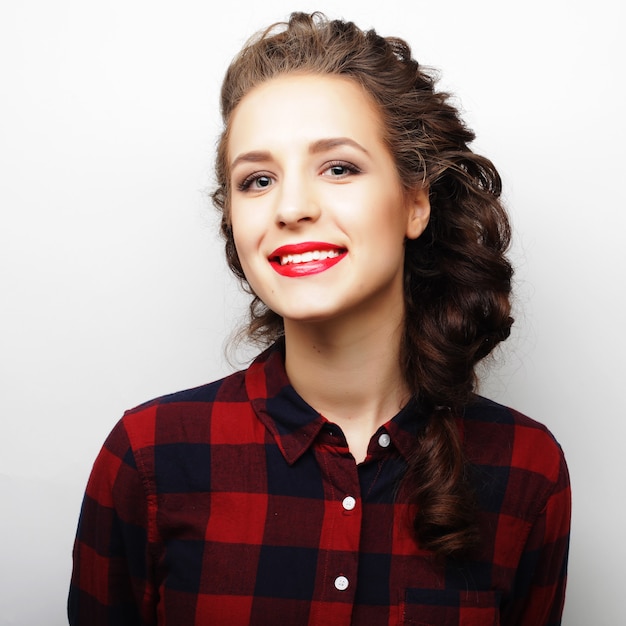 Woman hair style portrait.Close up over white background.