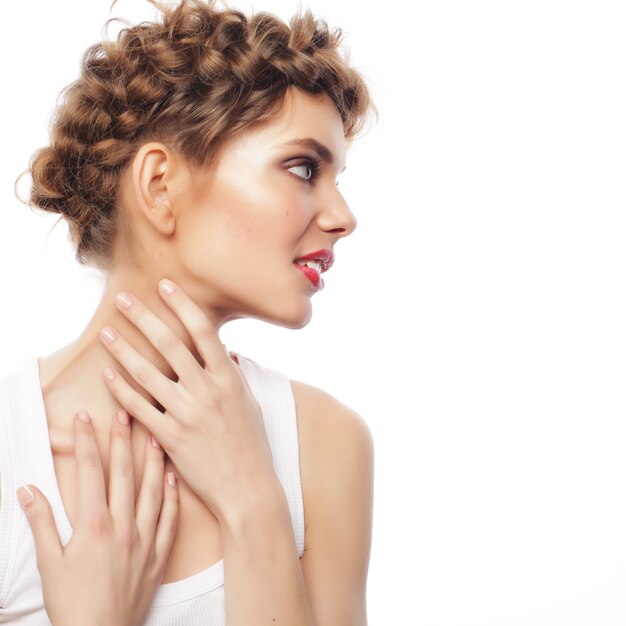 Woman hair style portrait.Close up over white background.