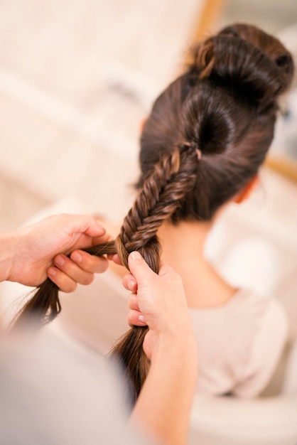 Woman and hair stylist