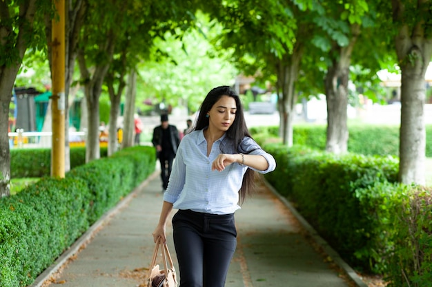 Woman hand bag and watch