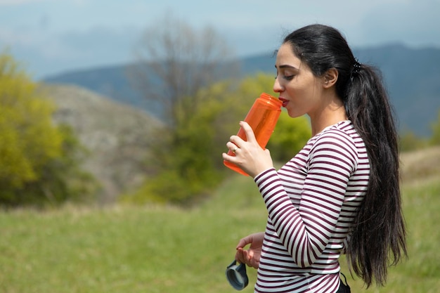 Woman hand bottle of water