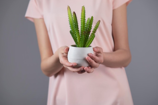 Woman hand cactuse