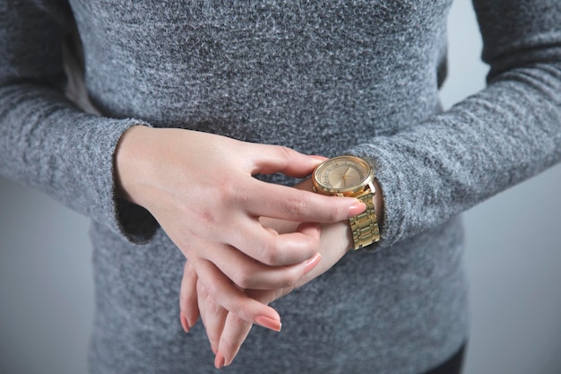 Woman hand clock