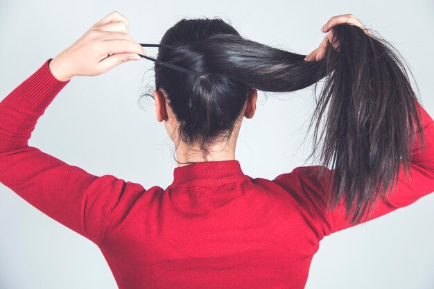 Photo woman hand hair tail