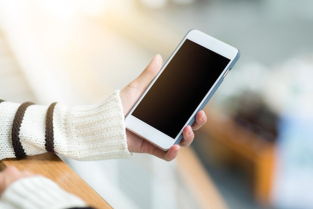 Woman hand hold with cellphone