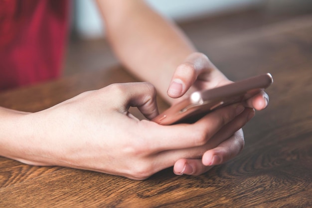 Woman hand holding smart phone