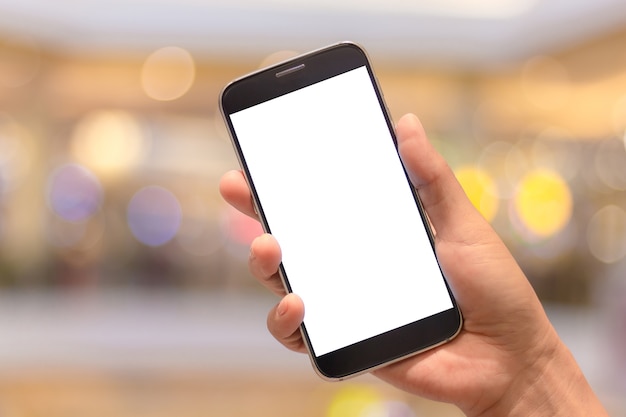 Woman hand holding a white screen smartphone