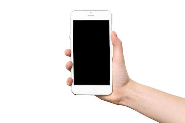 白い背景で隔離の空白の画面で白いスマートフォンを持っている女性の手