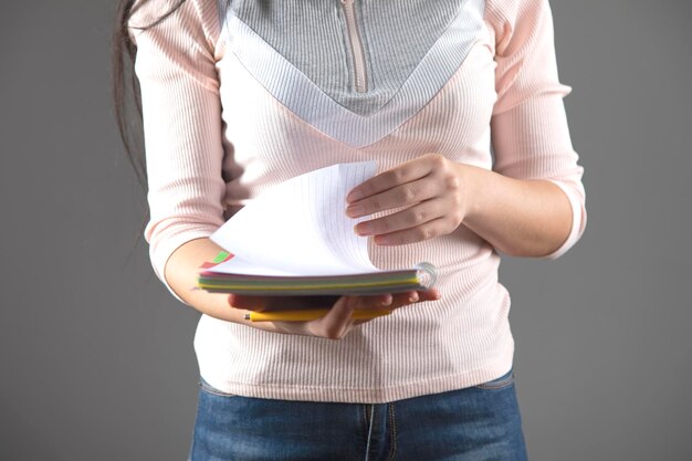 Woman hand pen and notepad