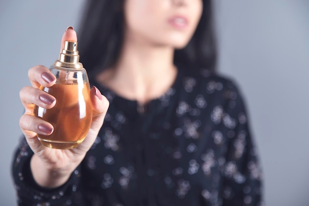 Woman hand perfume