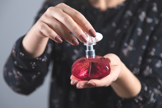 Woman hand perfume