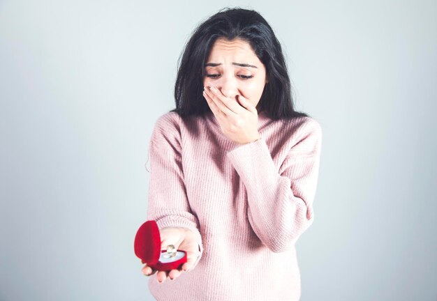 Woman hand red heart with ring