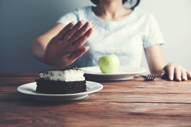 Woman hand stop sign in cake