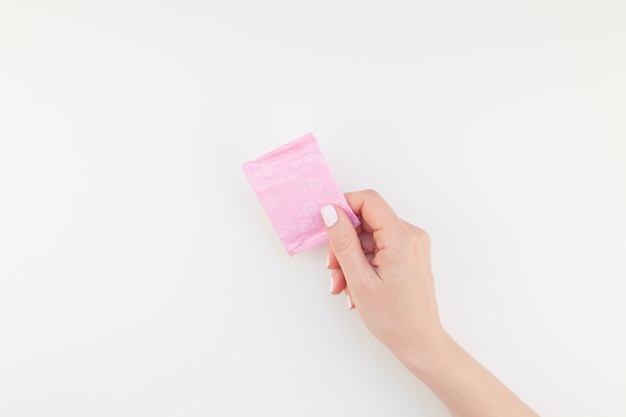 Woman hand with daily sanitary napkin