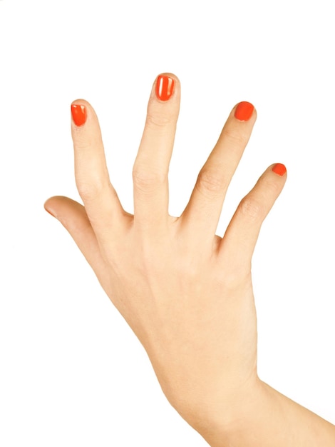 Woman hand with painted nails on a white background