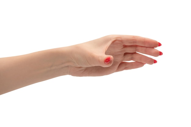 Woman hand with red nails holding something