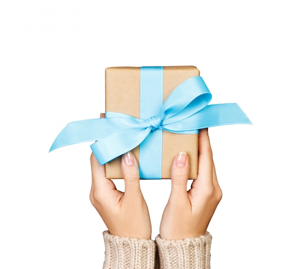 Woman hands give handmade present 