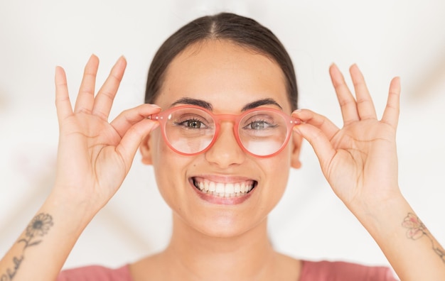 Woman hands glasses and eye beauty for healthy eyecare lifestyle Happy model smile and excited for confident healthy portrait look vision support and holding sunglasses in white background studio