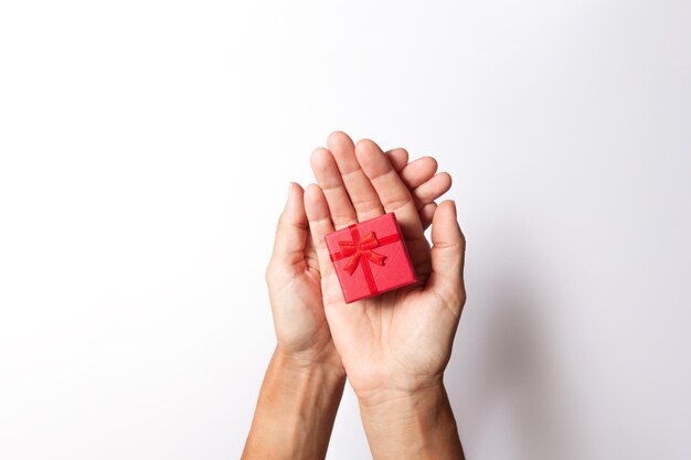 Woman hands holding gift