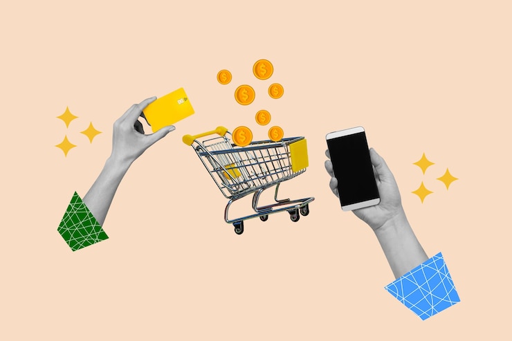 Photo woman hands holding a smartphone and a credit card with a shopping cart and coins on a beige background