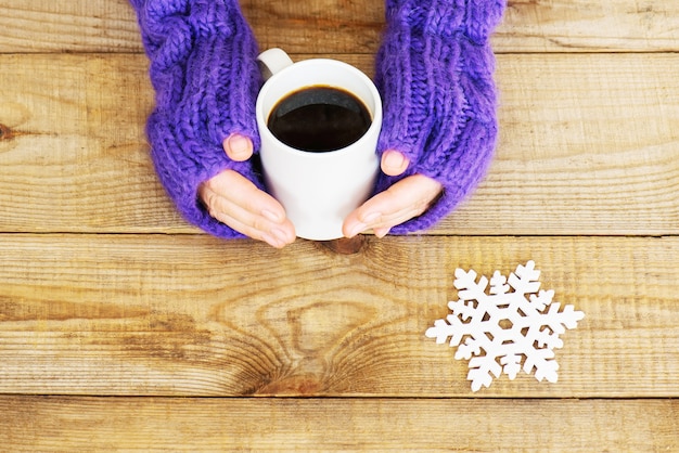 Woman hands in teal gloves