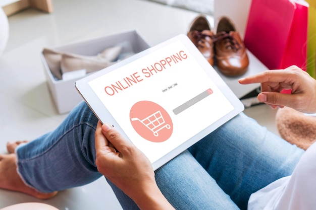 Photo woman hands using laptop for ordering fashion online website while sitting on couch at home e commerce business and technology digital marketing online shopping concept