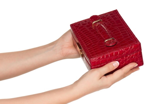 Woman hands with red box isolated on white background