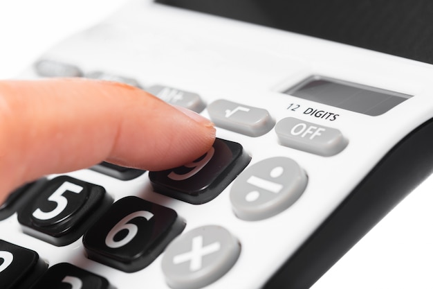 Woman hands working on calculator close up