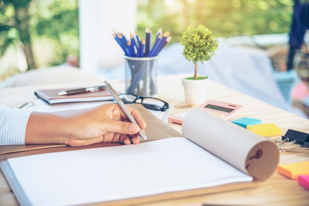 Woman hands working on table outdoor