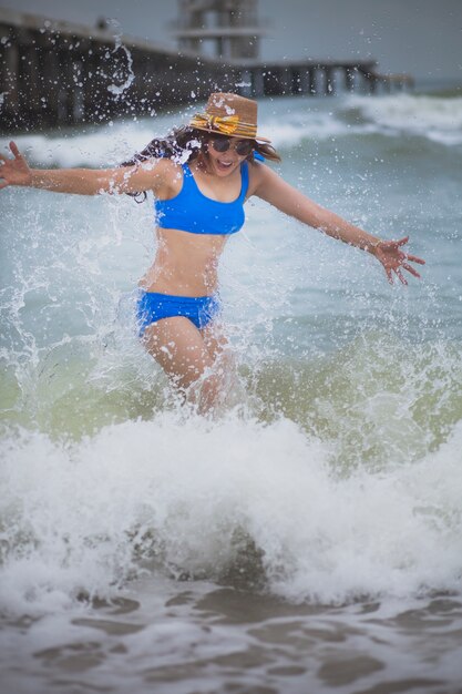 Woman happiness on vacation sea beach