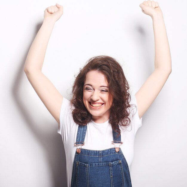 woman happy ecstatic celebrating being a winner.