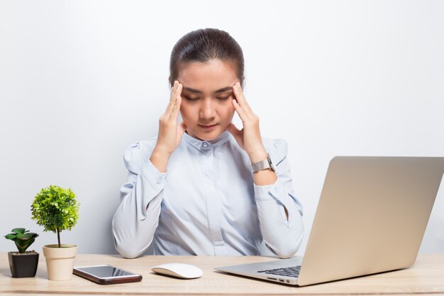 Woman has headache after hard work