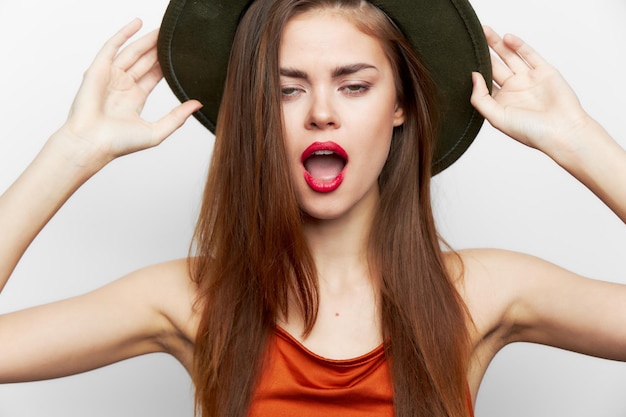 Woman in a hat open mouth luxury charm model